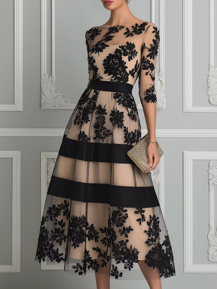 Robe midi élégante de coupe A en dentelle noire