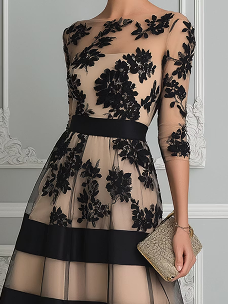 Robe midi élégante de coupe A en dentelle noire